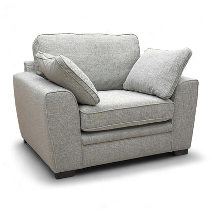 Full front-angled view of the Sofology Chalfont Armchair in Sort Silver/Platinum fabric