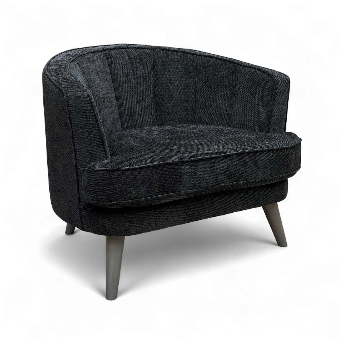 Full front-angled view of the Sofology Aurelia Accent Chair upholstered in black Calix Boucle fabric, highlighting its mid-century modern design.