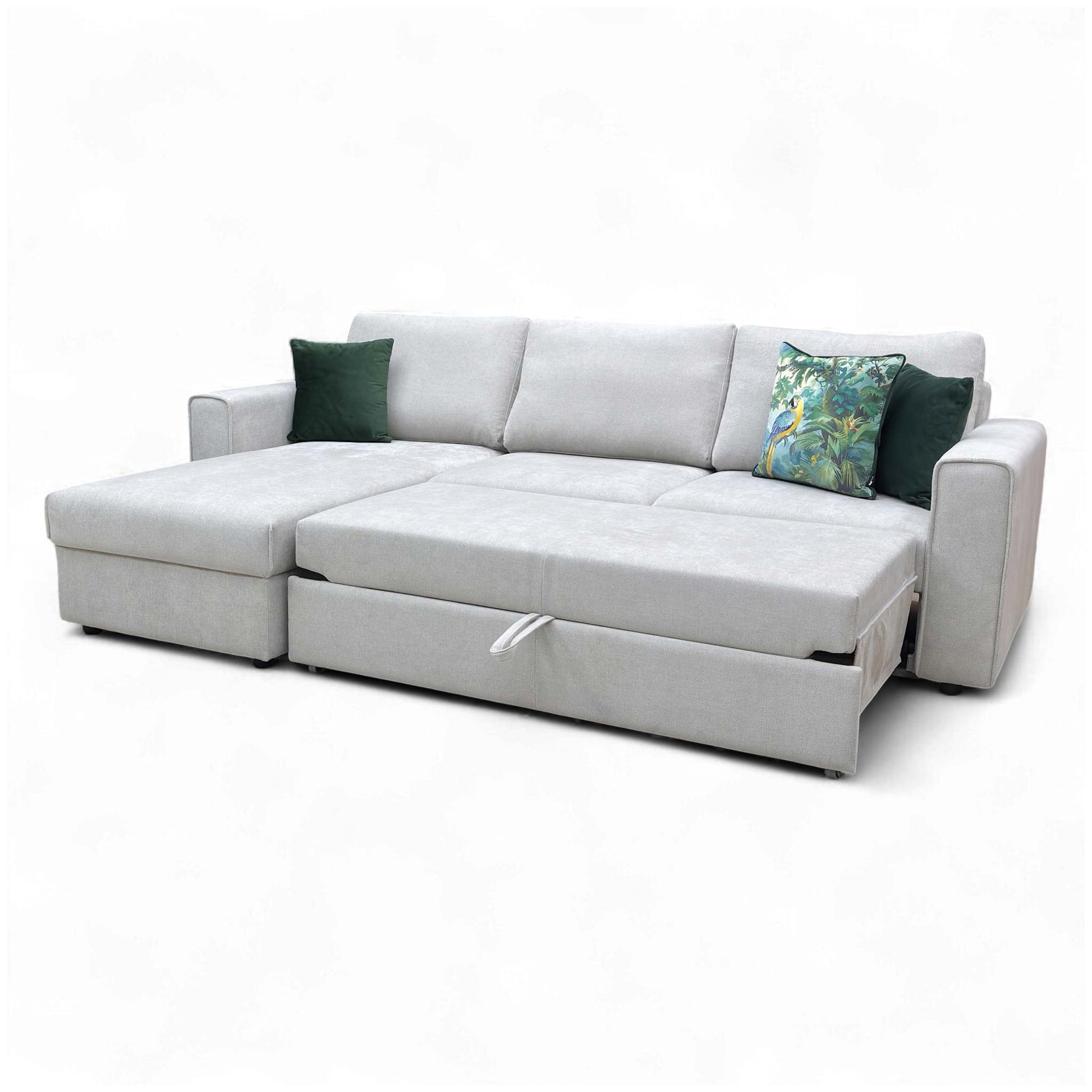 Side view showing the extendable footrest partially deployed, illustrating the mechanism sliding out from under the chaise.