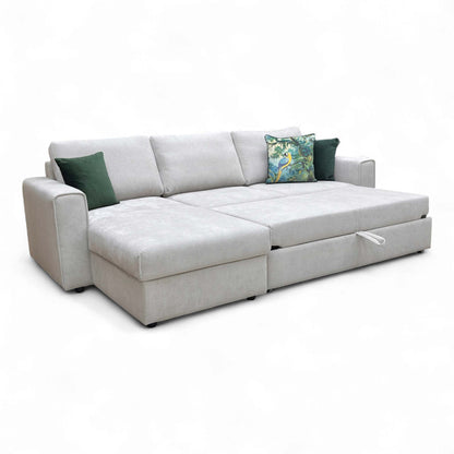 Full front-angled view of the sofa with the extendable footrest fully open.