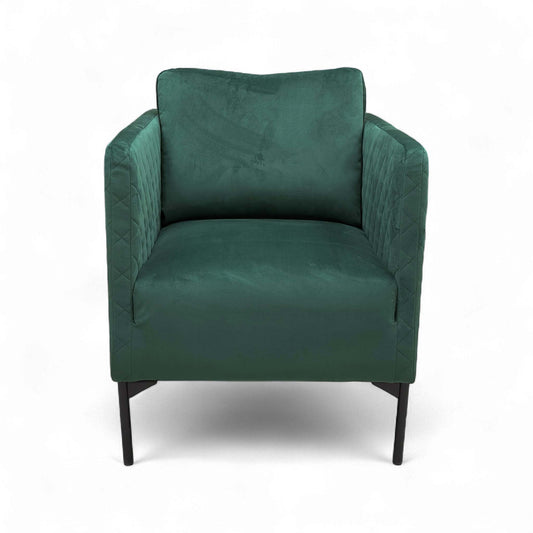 Full side view of the tub chair, emphasizing the deep, rounded sides and low profile.