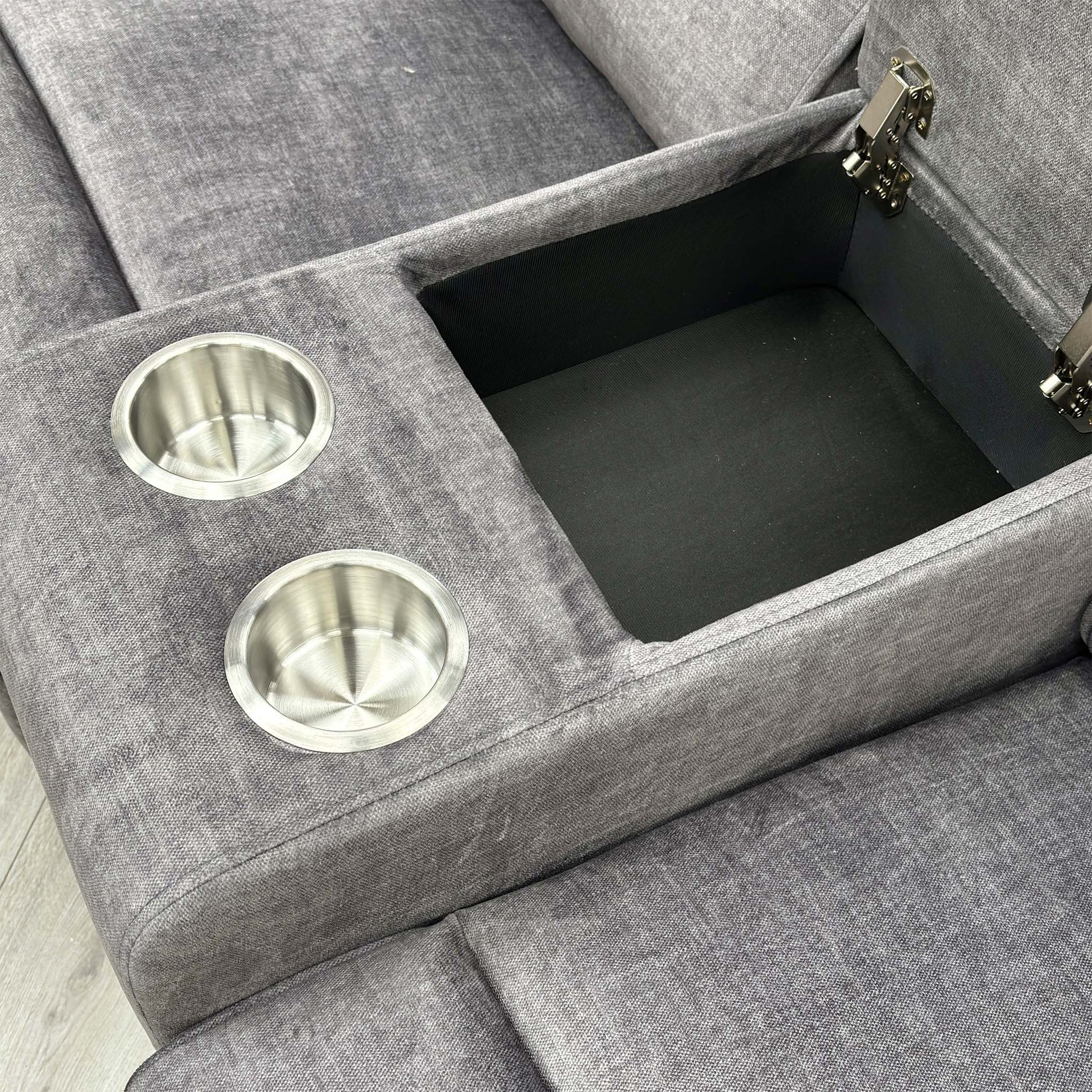 Close-up of the center console on the Savoy sofa, open to show the internal storage space and two cup holders.