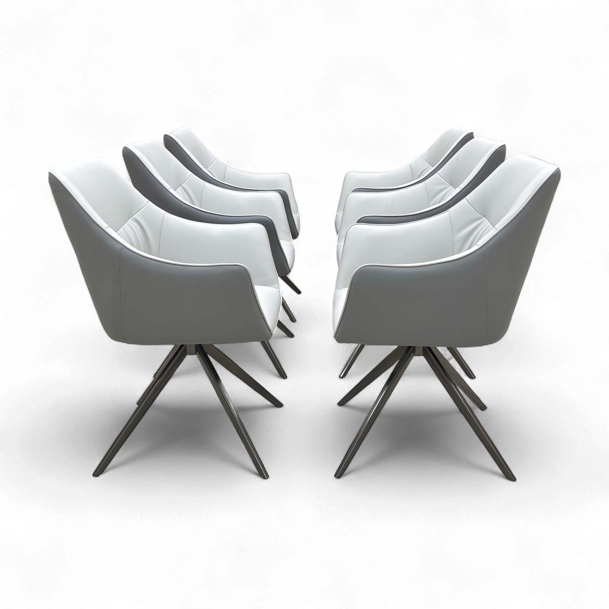 Full side profile of the Portofino Dining Chair, showing the fixed metal leg frame and upholstered seat.