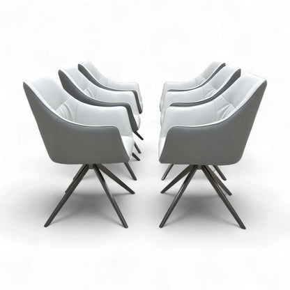 Full side profile of the Portofino Dining Chair, showing the fixed metal leg frame and upholstered seat.