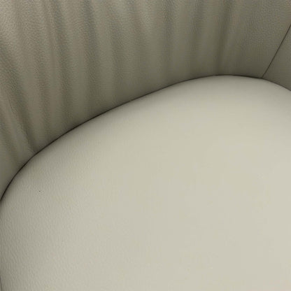 Close-up texture shot of the two-tone grey faux leather upholstery on the Portofino dining chair.