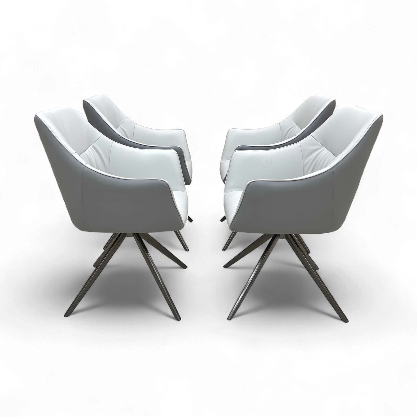 Full side profile of the Portofino Dining Chair, showing the fixed metal leg frame and upholstered seat.