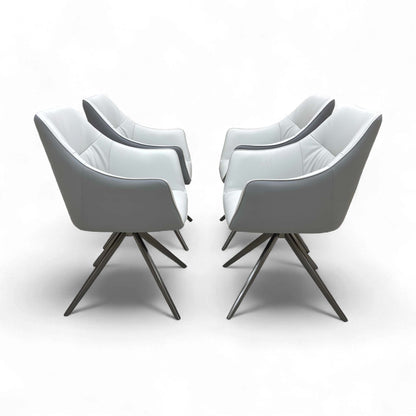 Full side profile of the Portofino Dining Chair, showing the fixed metal leg frame and upholstered seat.