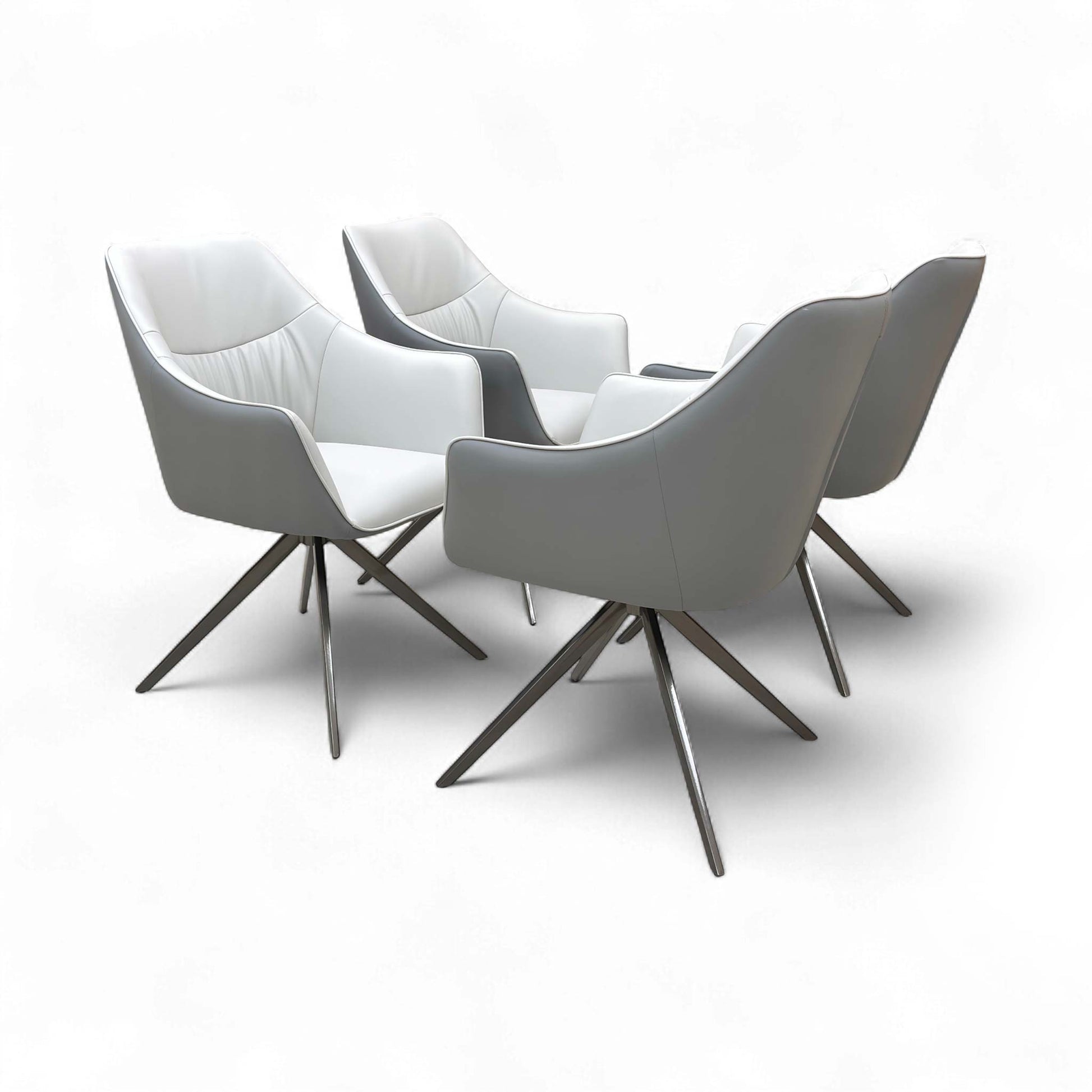 Angled view of the Portofino Fixed Dining Chair in Two-Tone Grey Faux Leather, highlighting the modern design.