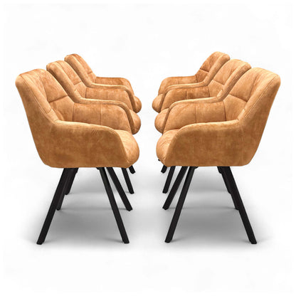 Full side profile of the 'Jade' Swivel Dining Chair in Rust Orange Velvet, highlighting the chair's modern shape and black base.