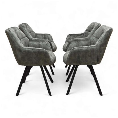 Full side profile of the 'Jade' Swivel Dining Chair in Olive Green Velvet, highlighting the chair's modern shape and black base.