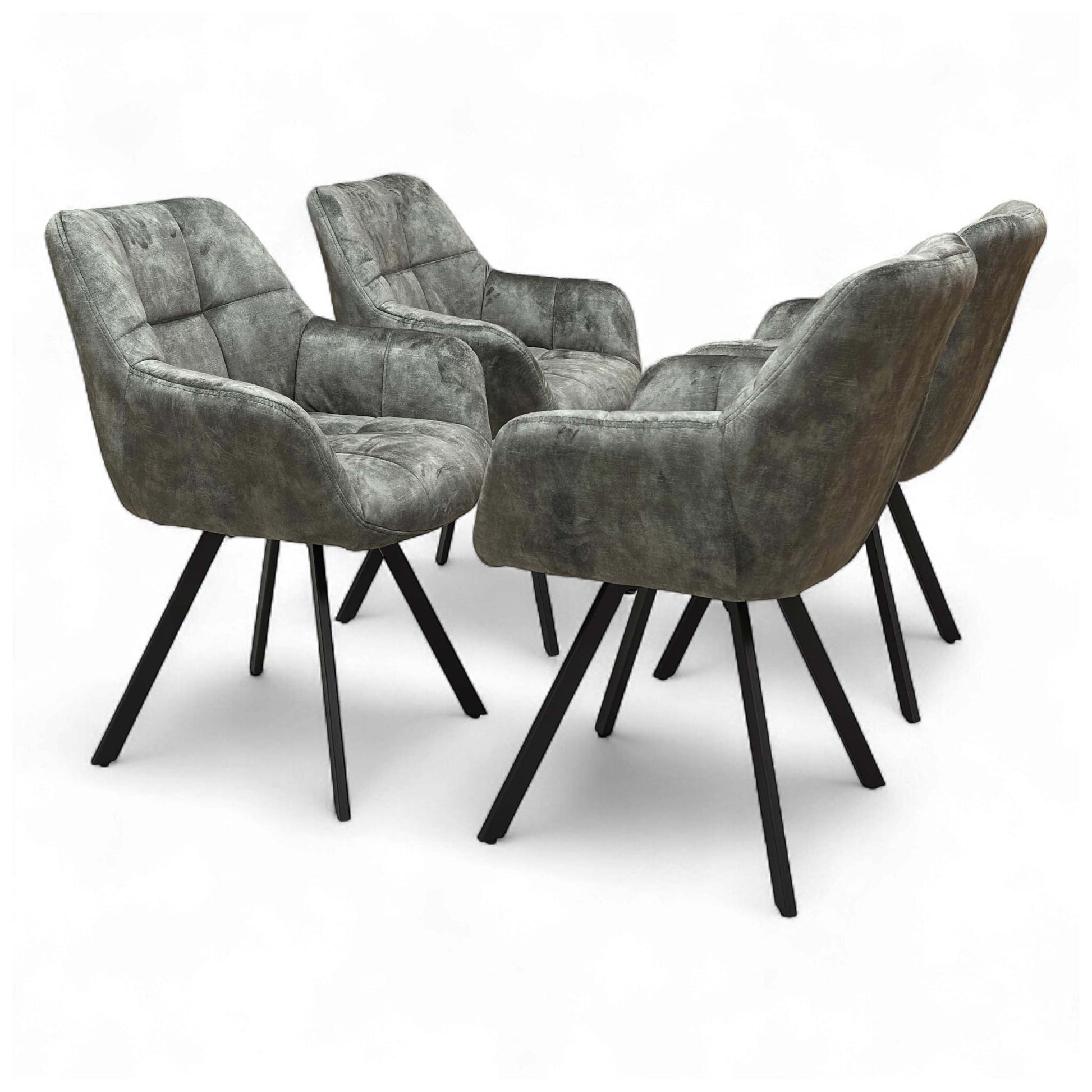 Angled view of the 'Jade' Olive Green Velvet Swivel Dining Chair, showcasing its upholstered seat and black metal legs.