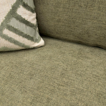 Close-up of the 'Jackson' Armchair in Fern Green Chenille, showcasing the deep cushioning, reversible seat cushion, and rounded arms.