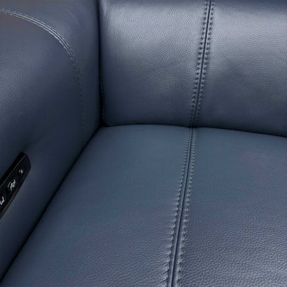 Detail shot of the armrest of the Ocean Blue Leather Sofa, highlighting the leather texture and the contrast stitching.