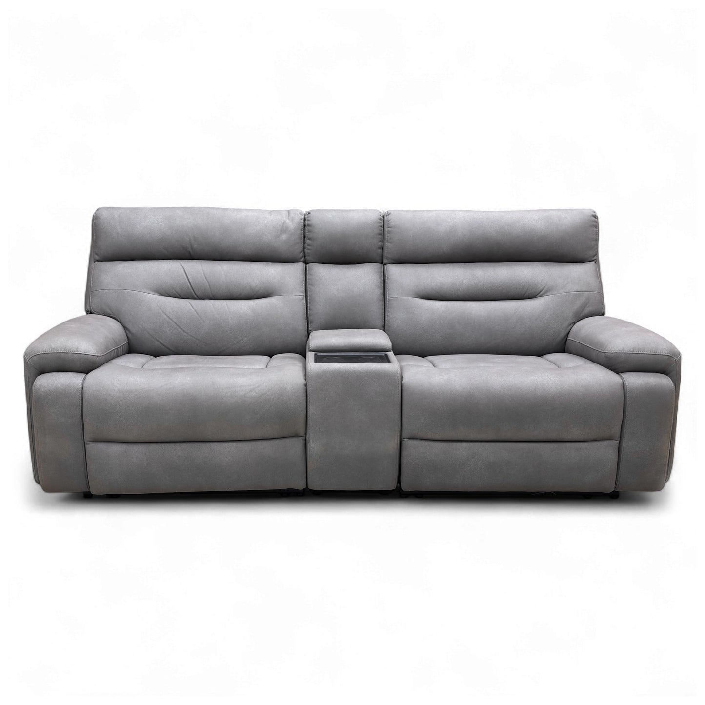 The 'Cinemax' Power Recliner Sofa shown in its reclined position, highlighting the extended footrests and adjusted power headrests.