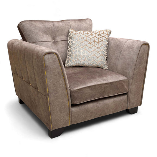 Angled view of the 'Mariah' Armchair, showcasing the scroll arms, deep seat cushion, and dark wooden legs.