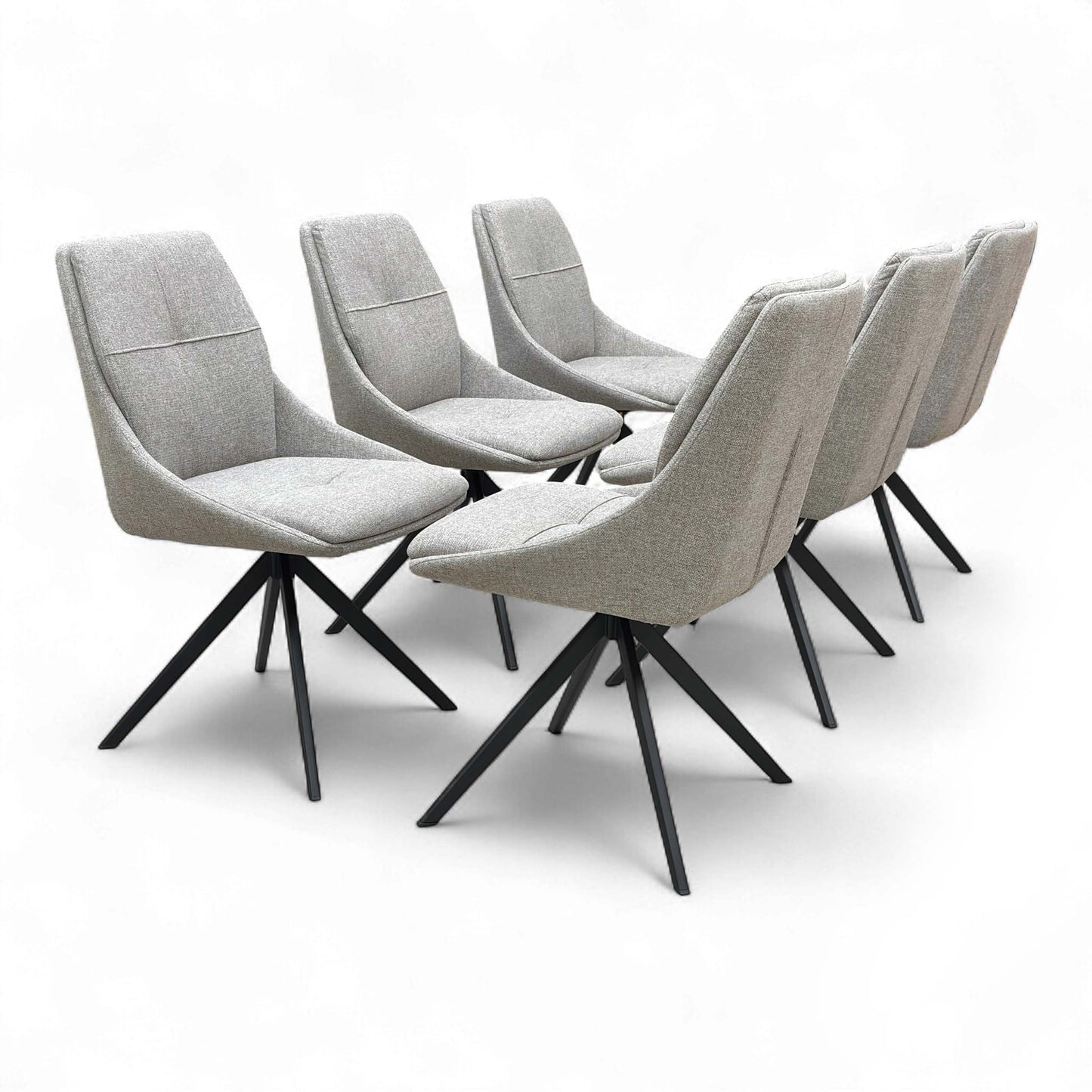 Two Latte Swivel Dining Chairs angled together.