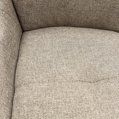 close view of a single chair focusing on the seat and base.