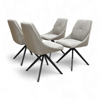Back view of the ‘Jasmine’ Swivel Dining Chair, showing the smooth curve of the backrest and the metal leg structure.