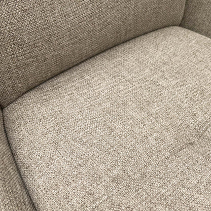 close view of a single chair focusing on the seat and base.