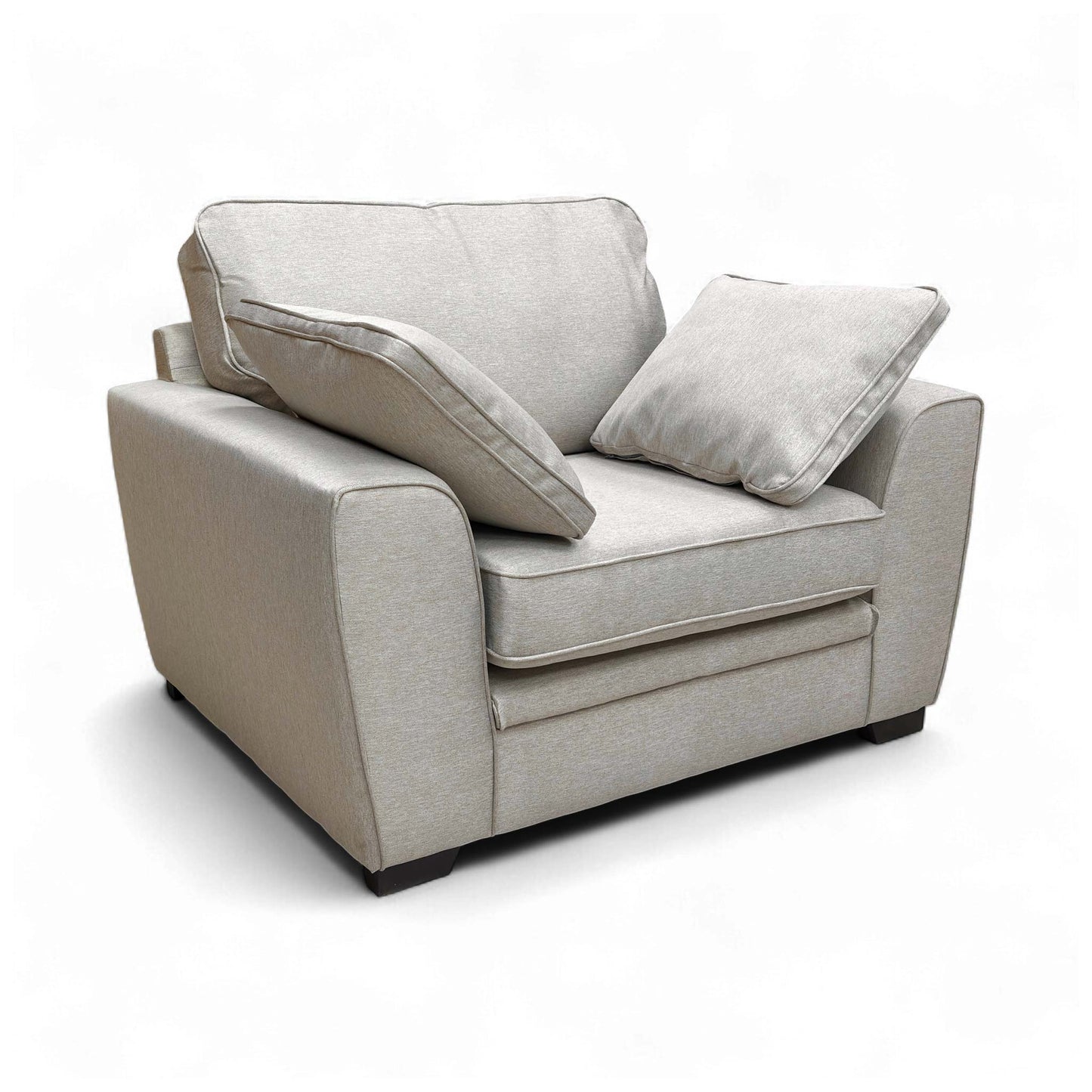 Angled view of the Chalfont Armchair, highlighting the biscuit-colored tight weave fabric and contemporary shape.