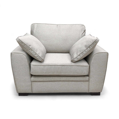 Full front view of the Sofology 'Chalfont' Novak Biscuit Fabric Armchair, showcasing its generous seating space and sloped arms.