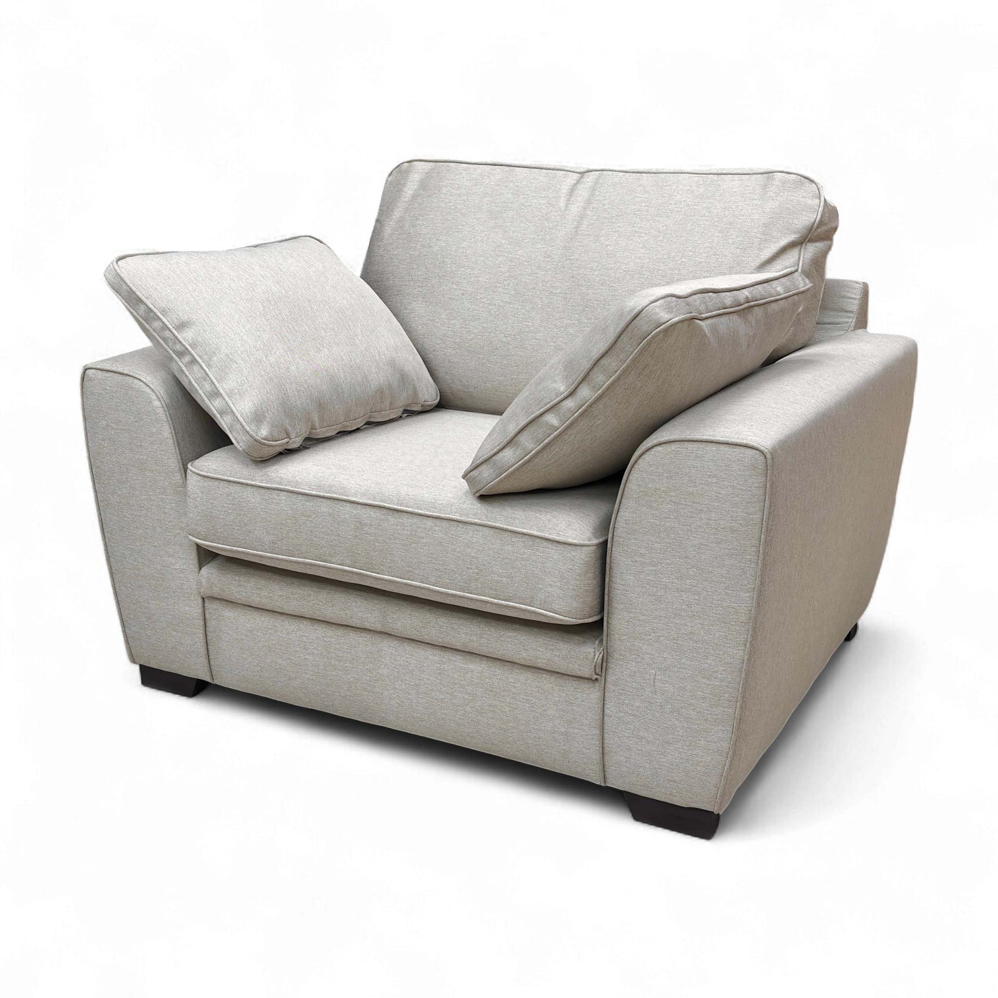 Side view of the armchair, displaying its overall depth and the gentle slope of the armrests.