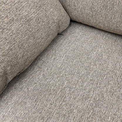 Detailed close-up of the Orm Silver tight weave fabric upholstery, highlighting the texture and sloped arm design.