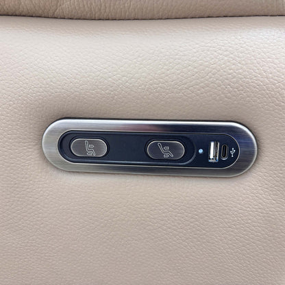 Close-up of the easy-to-use control button panel for the electric power recliner mechanism, typically located on the side of the sofa.