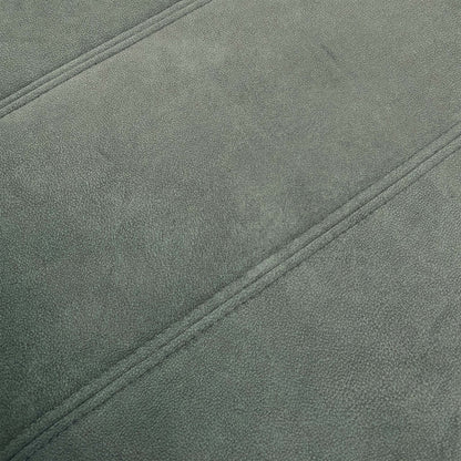 Close-up of the footstool's base and velvet fabric, highlighting the quality of the finish.