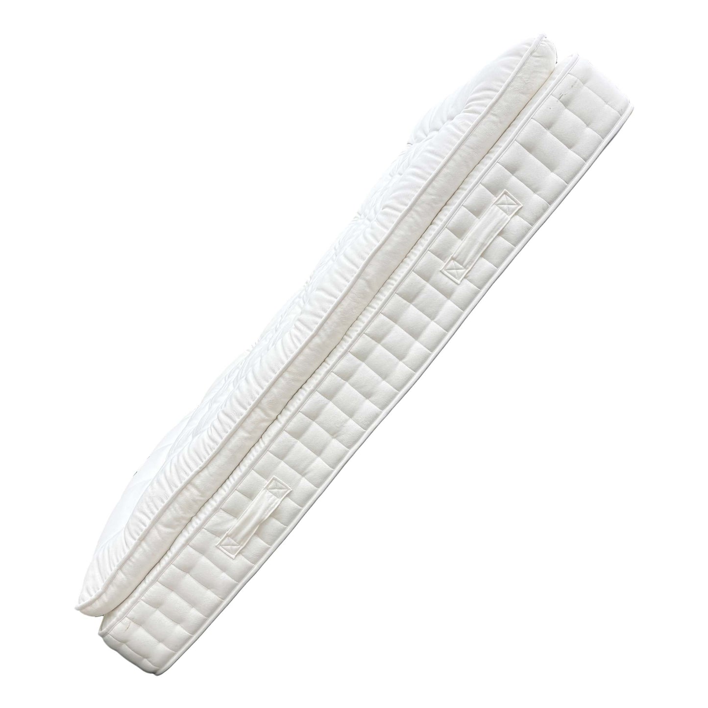 Close-up of the mattress side and handles.