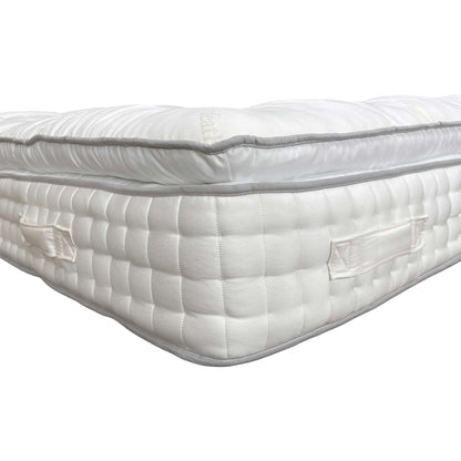 Close-up shot illustrating the Split Tension feature, showing the distinct difference between the Soft and Medium comfort sides of the King mattress.