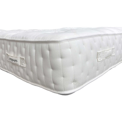 Close-up of the official Harrison Spinks / Feather & Black branding label and tag, confirming the high 20,000 spring count.