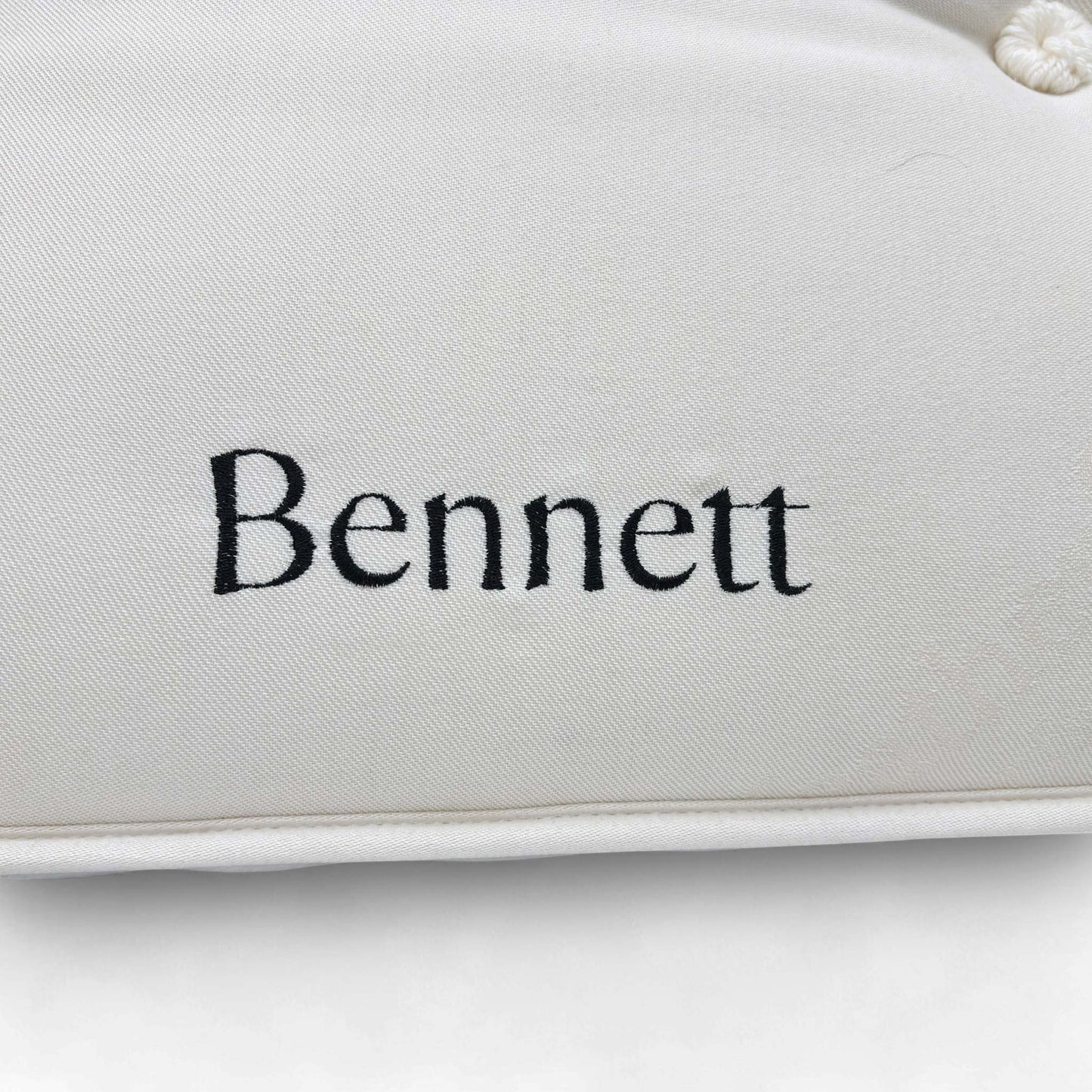 view of the Harrison Spinks 'Bennett' 3000 Pocket Spring Mattress, clearly illustrating the 25 cm profile/thickness, robust side border, and white upholstery fabric