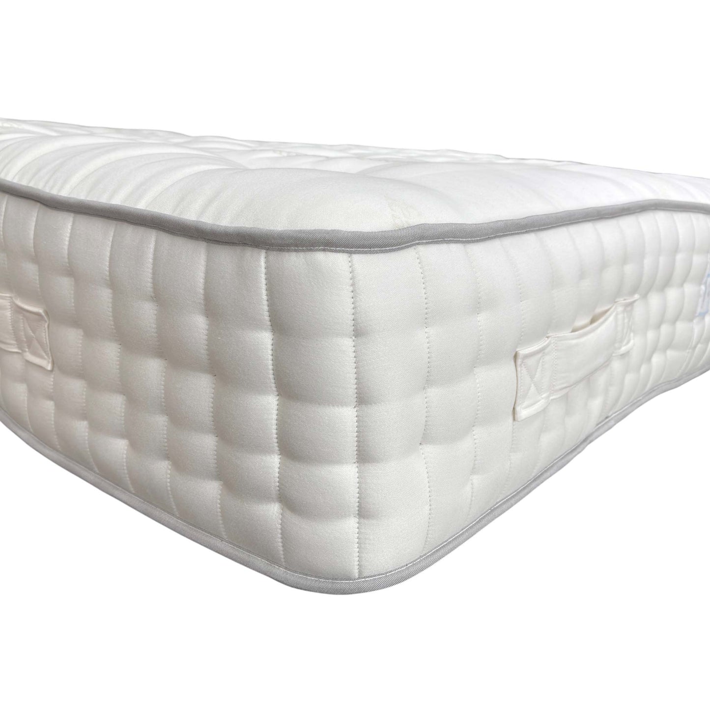 Close-up shot illustrating the Split Tension feature, showing the distinct difference between the Soft and Medium comfort sides of the King mattress.