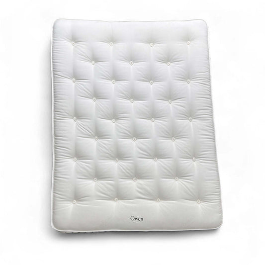 Full view of the Harrison Spinks ‘Owen’ 10,000 Pocket Spring King Mattress with a breathable white fabric cover, showcasing its deep profile.