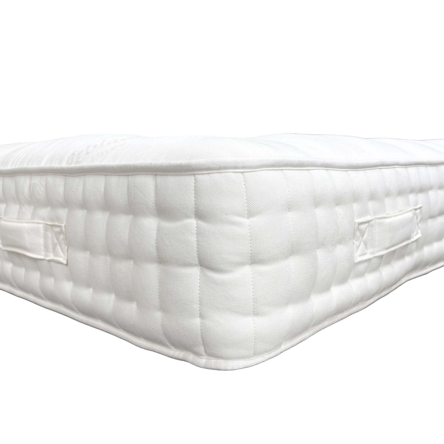 Detailed view of the sturdy, stitched handles on the side of the mattress, designed for easy rotation and movement.