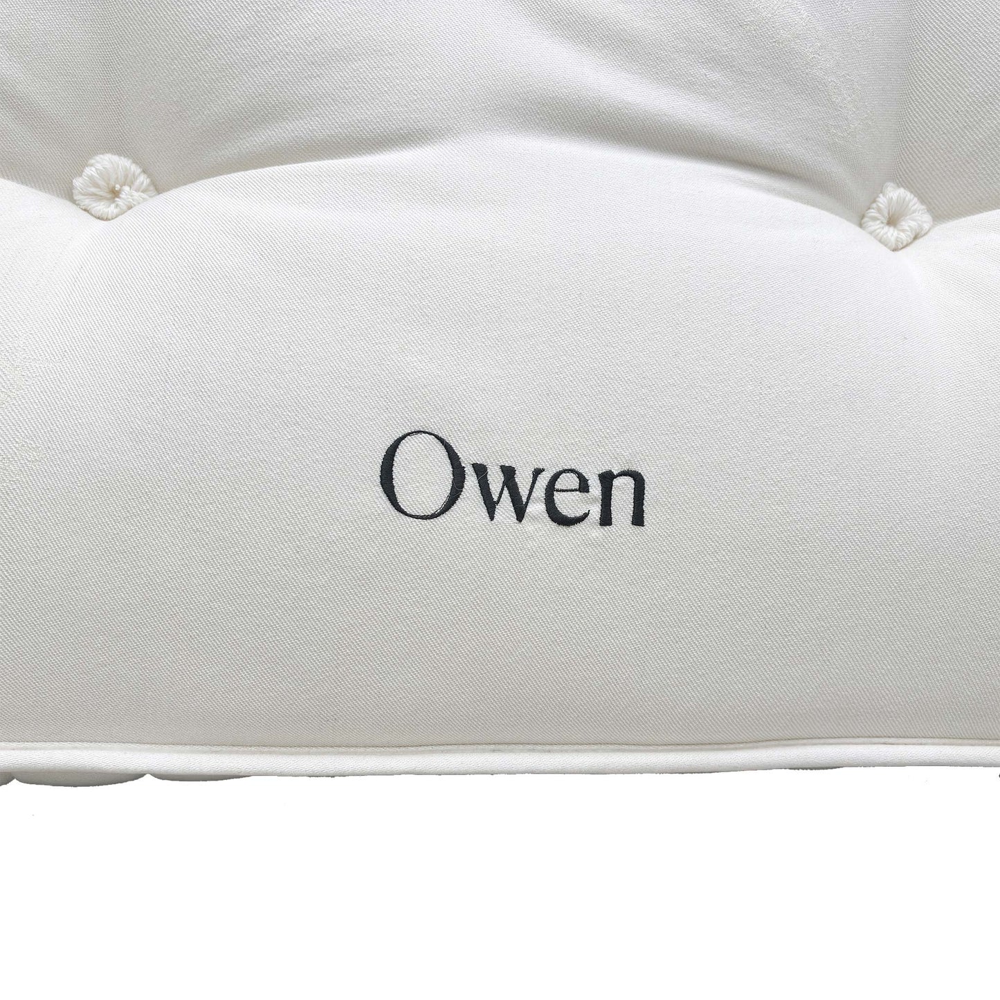 Close-up of the mattress label, confirming the Split Tension (Soft + Medium) feature for customized comfort.