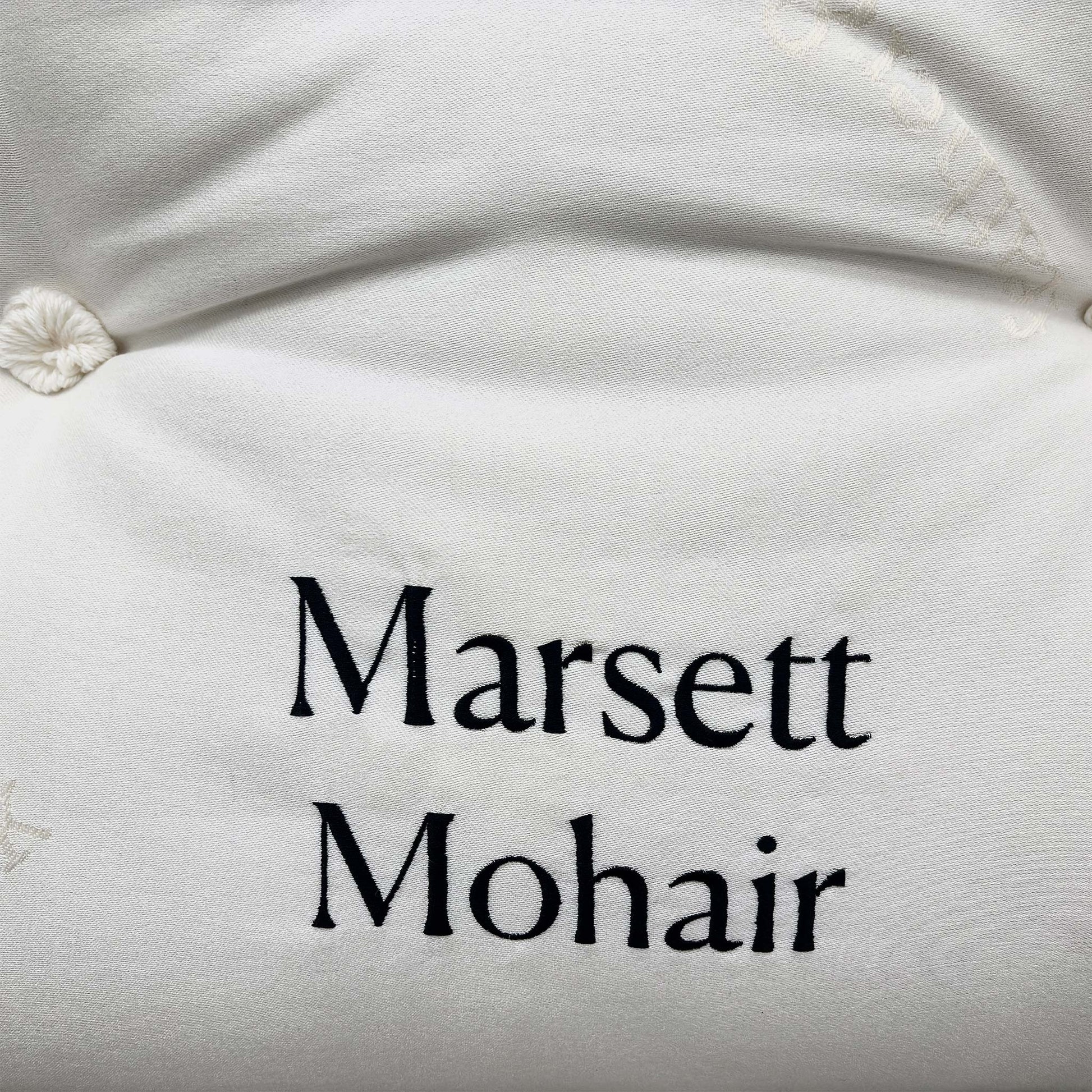 Angled view of the Harrison Spinks Marsett Mohair King Mattress, showcasing its height (35 cm) and luxurious profile on a bed base.