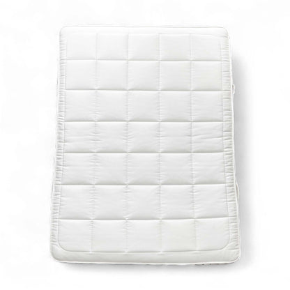 Full view of the mattress on a bed base, top-down perspective.