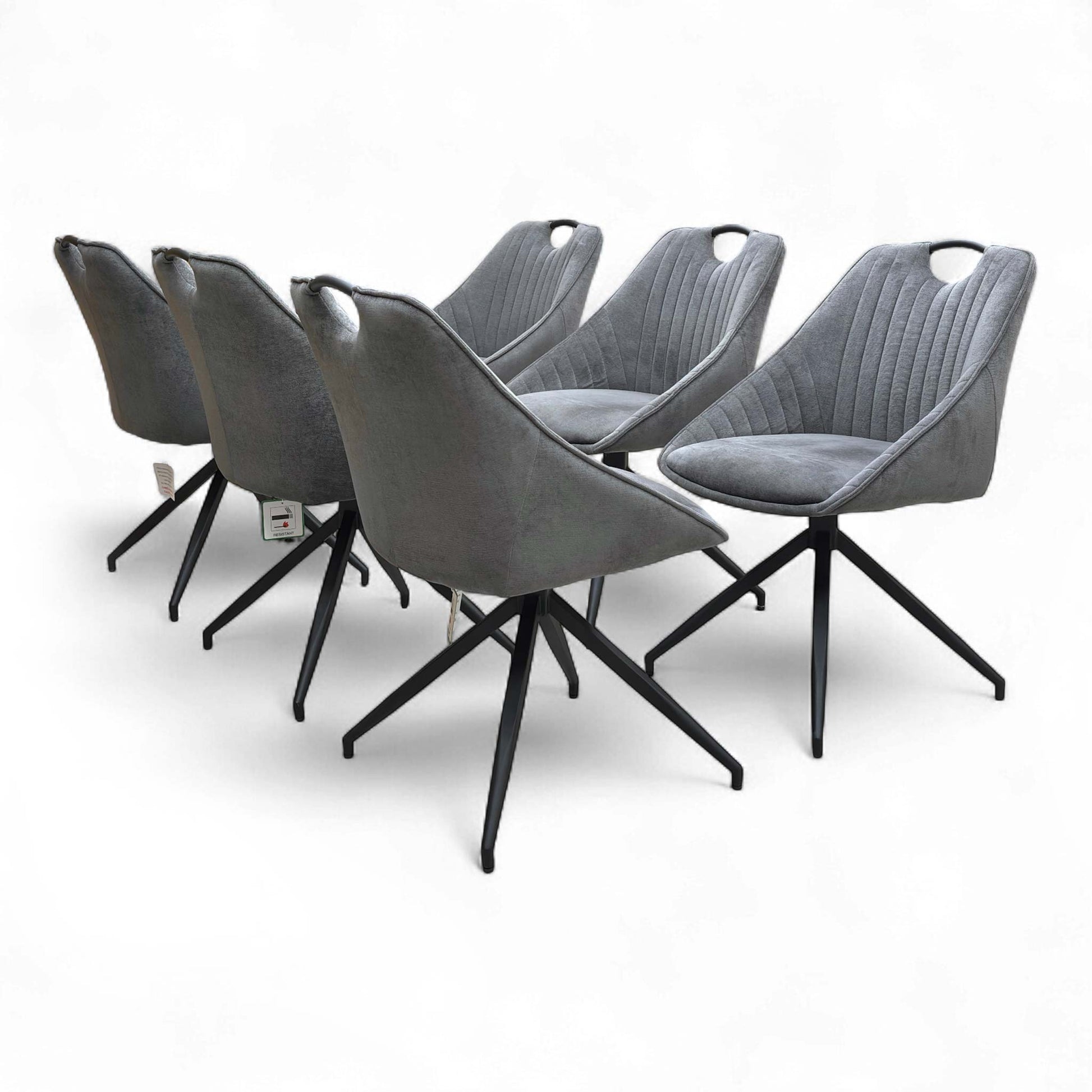 Side view of the chair, showing the profile and swivel base.