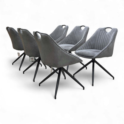 Side view of the chair, showing the profile and swivel base.