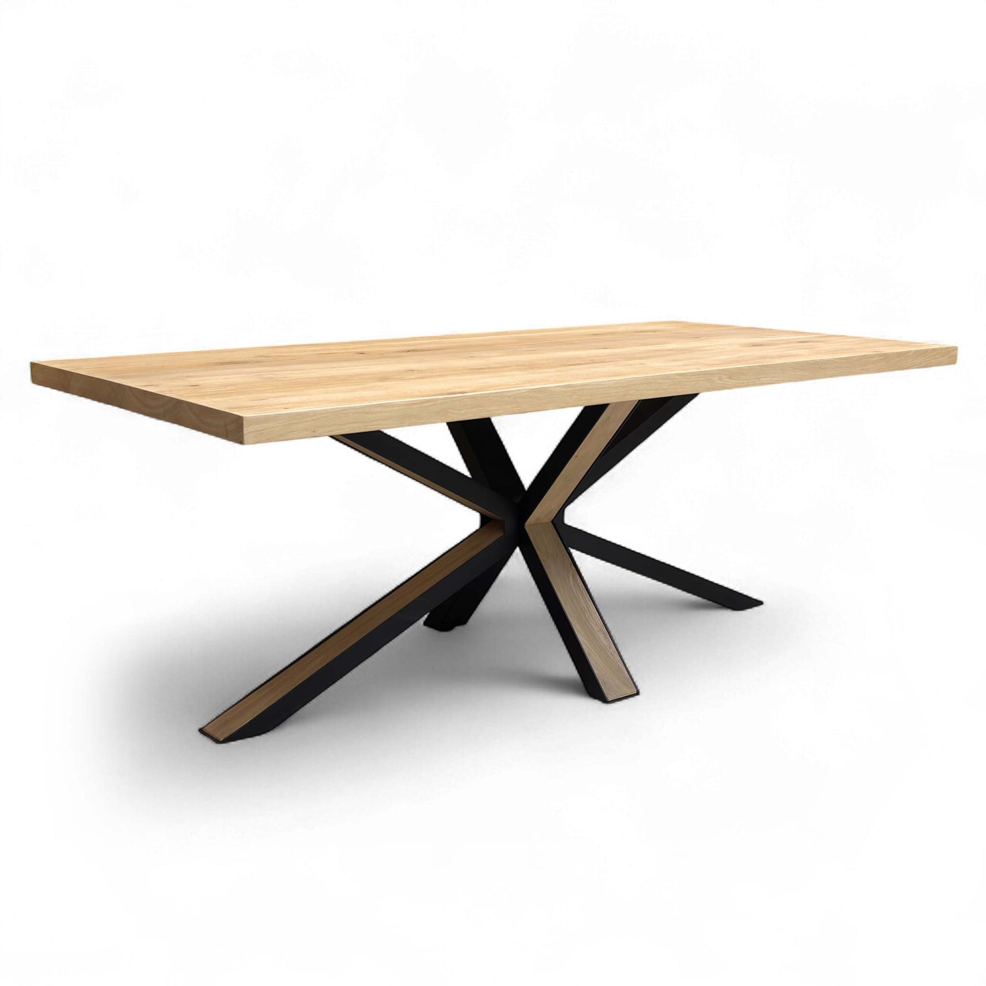 Angled view showing the natural wood tabletop and the starburst leg assembly.