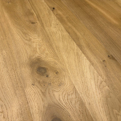 Close-up of the table surface and the meeting point of the legs and tabletop.