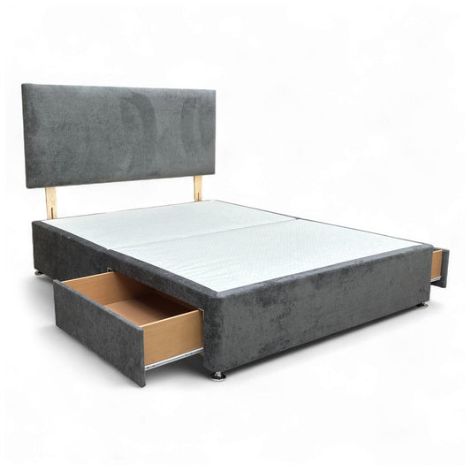 Full length view showing the divan base and a partially open drawer.