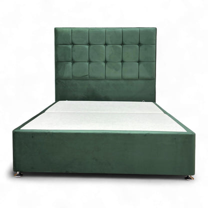 Full view of the Double 'Sleep Story Milne' bed set, featuring a tall, buttoned floor-standing headboard and divan base in vibrant Emerald Green Velvet.