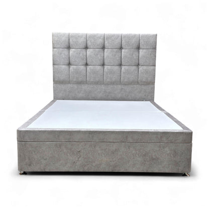 Full view of the King-size Sleepeezee 'Apex' bed, featuring a tall, buttoned floor-standing headboard and divan base in Dapple Silver Velvet.