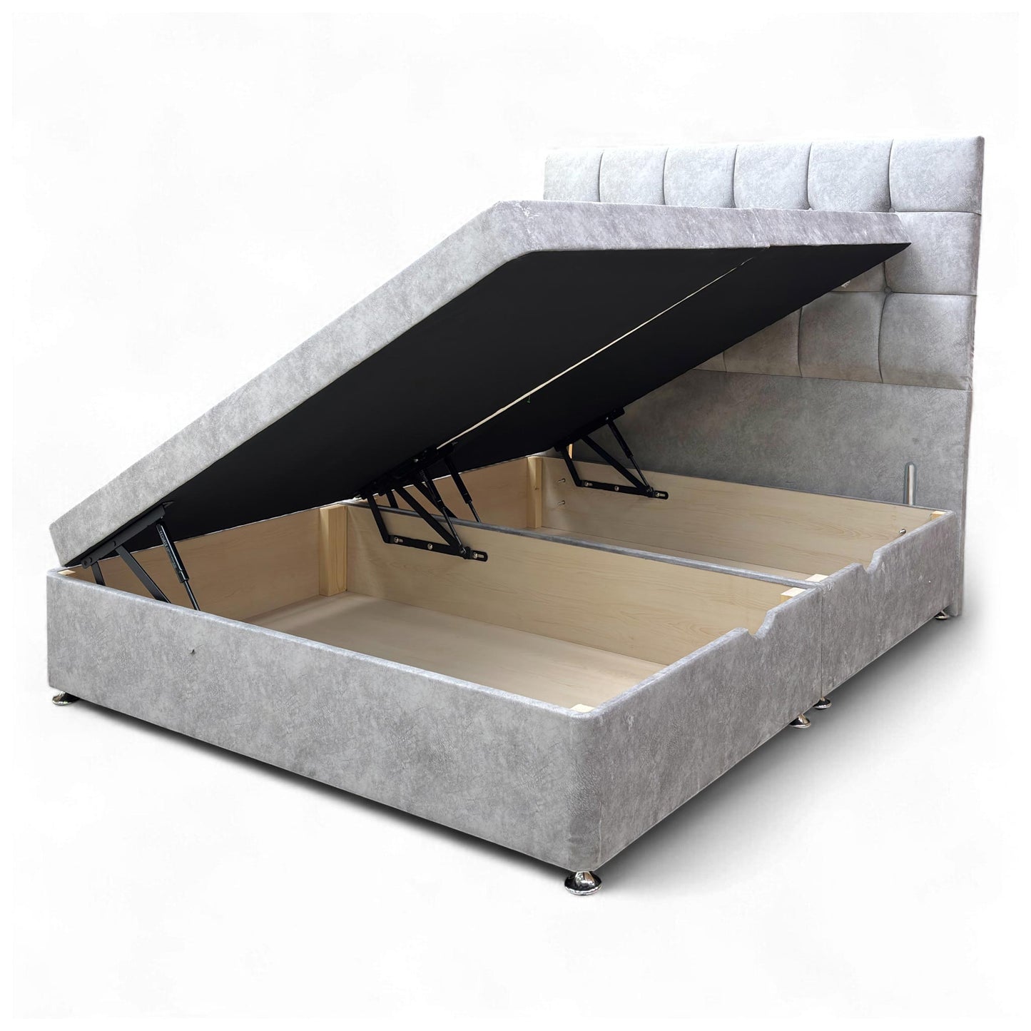 Close-up showing the side-lift ottoman mechanism of the King-size divan base open, revealing the spacious internal storage compartment.