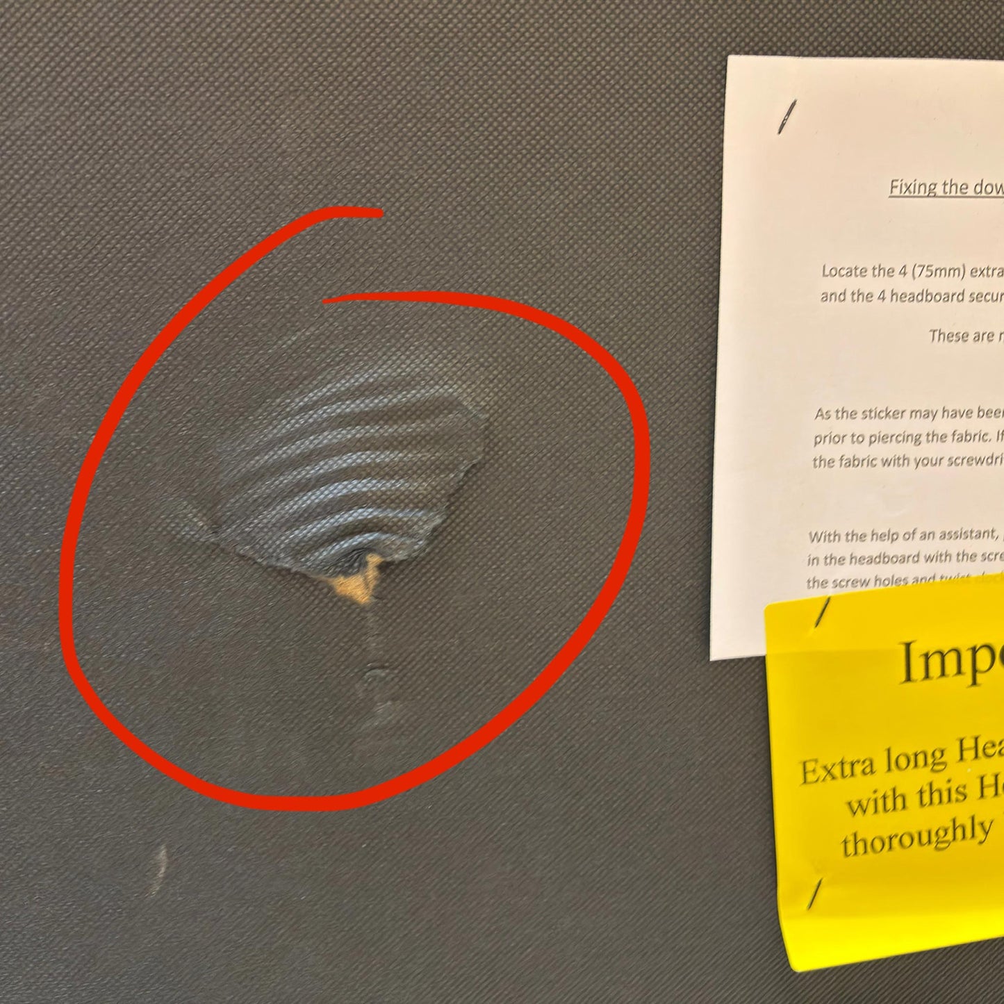 Second close-up image showing another area of damage/defect on the Sleepeezee 'Apex' bed.