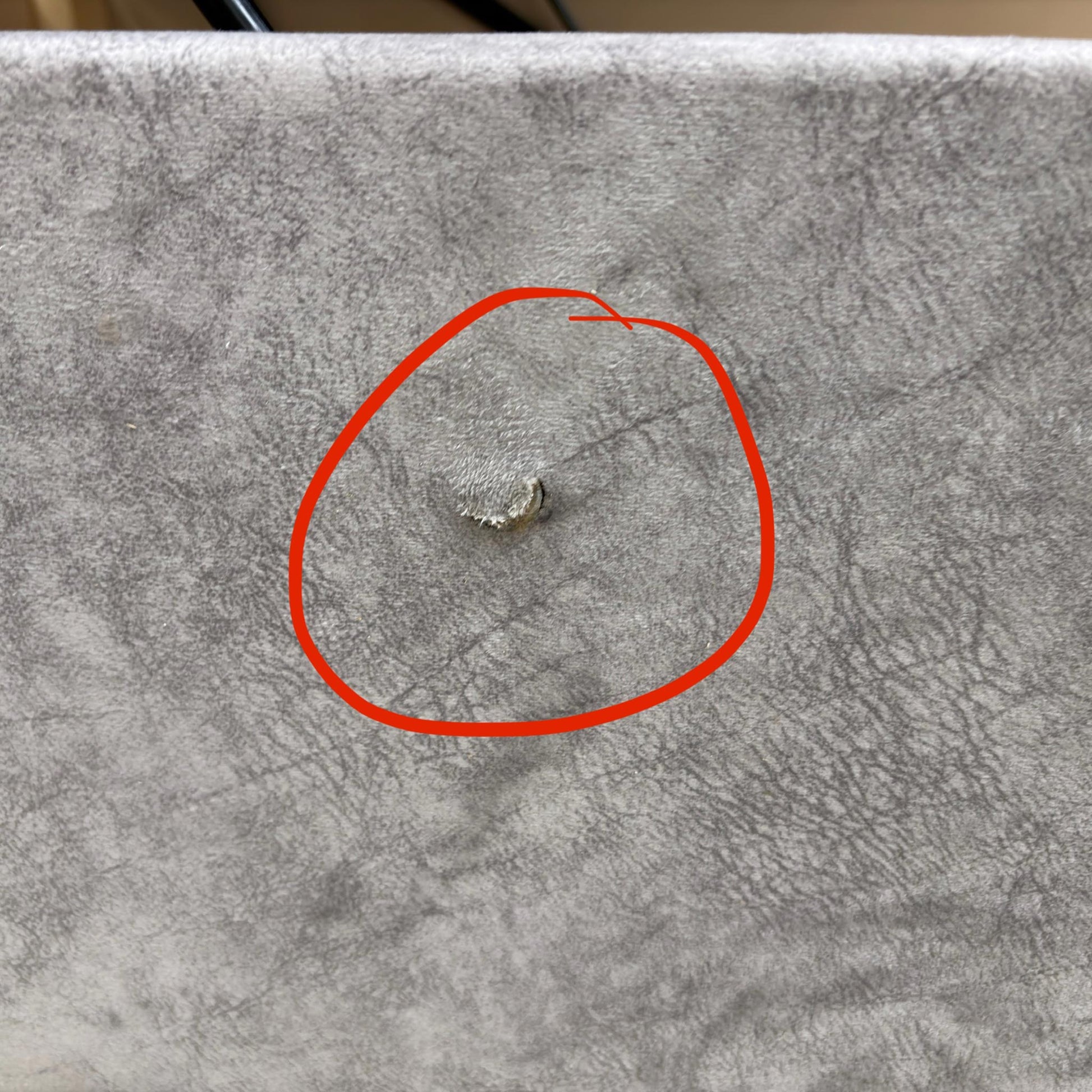 Third close-up image showing further damage or mark on the Dapple Silver Velvet headboard or divan base.