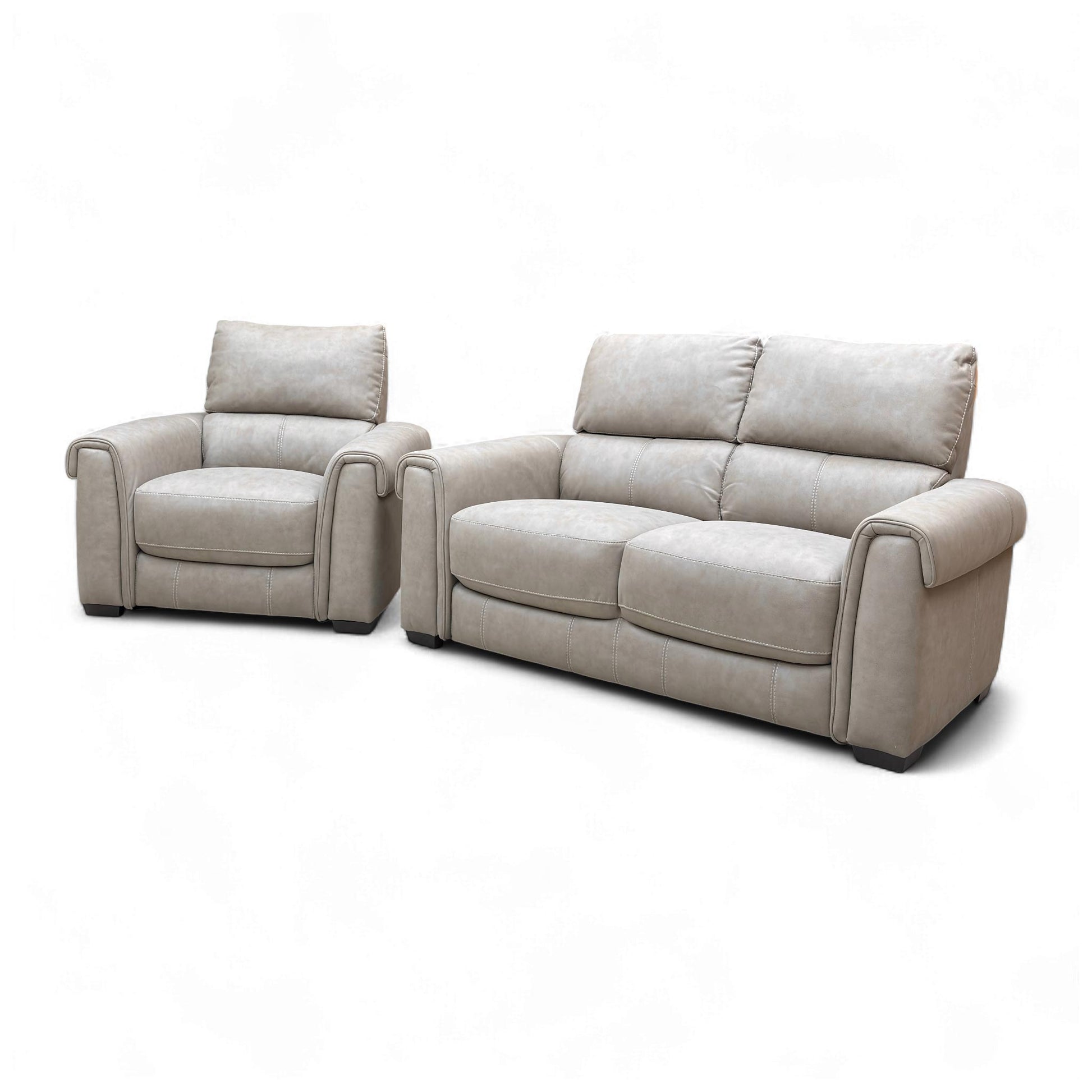 View of the Nixon 2 Seater Sofa and Chair, emphasizing the generous seating and the contemporary, comfortable design.